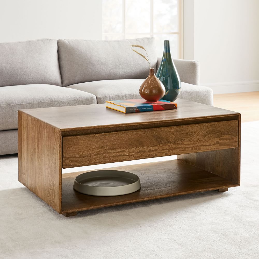 Sasser solid wood coffee clearance table with storage three posts