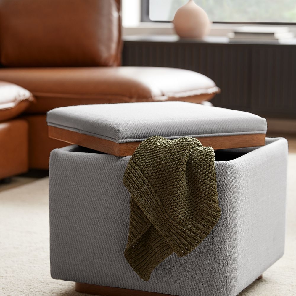 Lounge ii storage outlet ottoman with tray