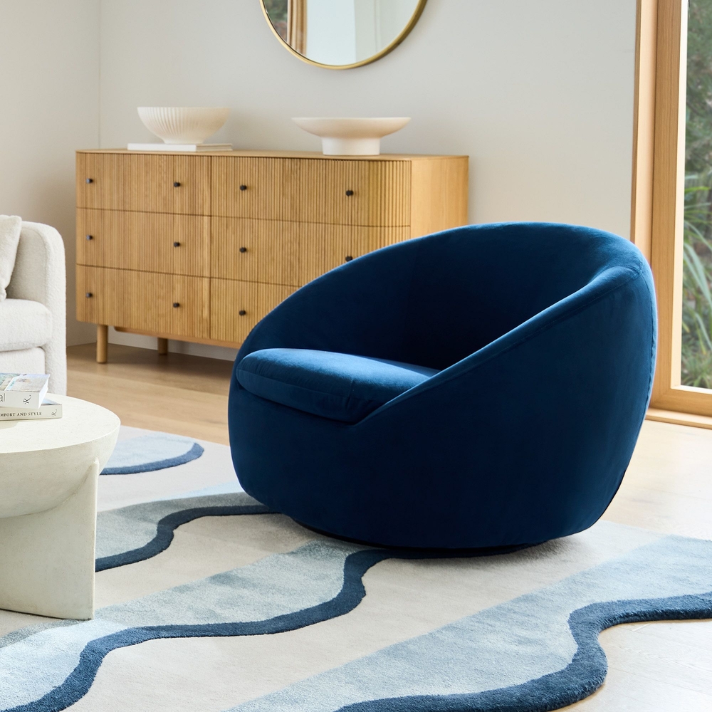 Blue swivel top chair living room