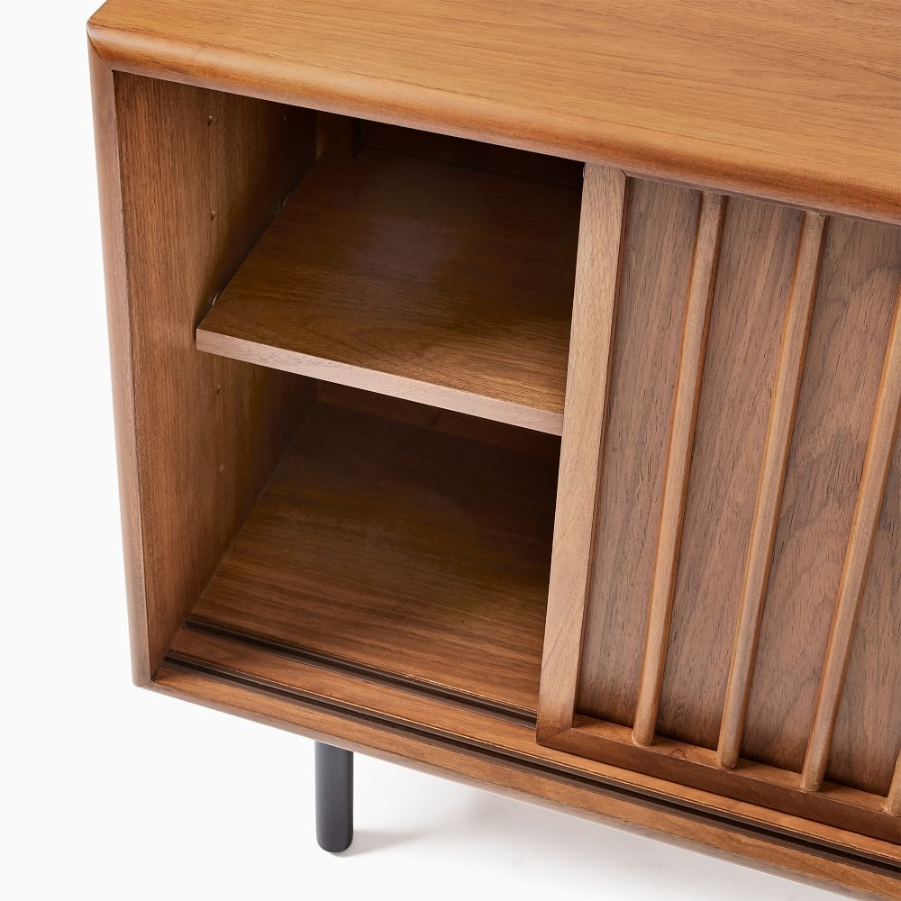 Narrow media shelf top